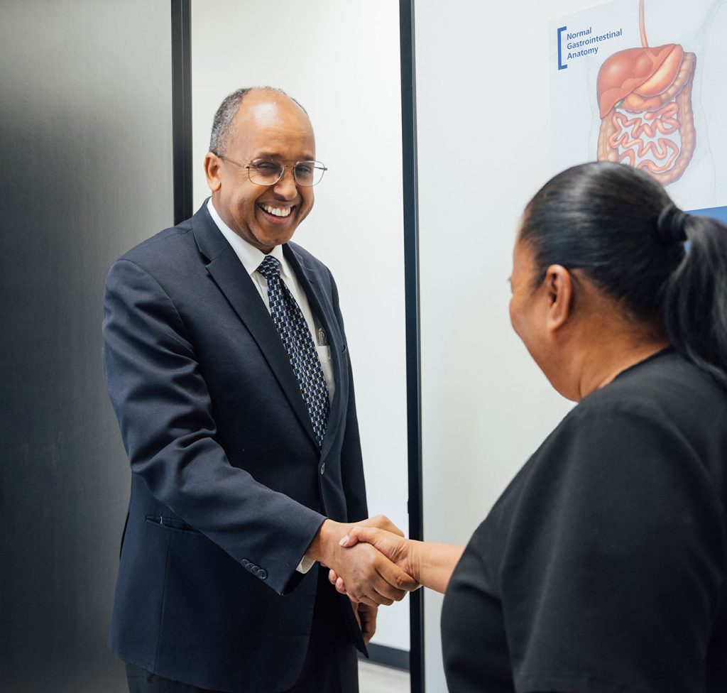 Dr Mustafa Ahmed greeting a visitor at Southern Nevada Bariatrics